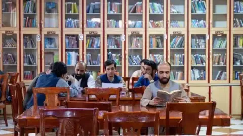 Afghanistan's rulers prohibit publications written by women from the nation's universities